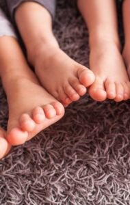 feet over carpet